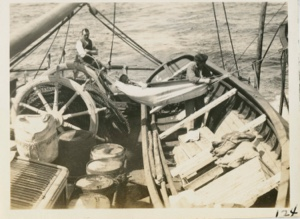 Image of Two men working on deck